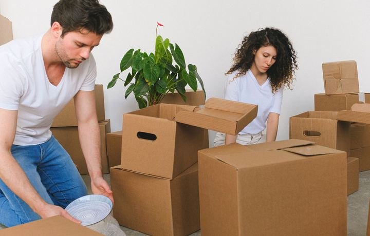 Packing boxes in a living room